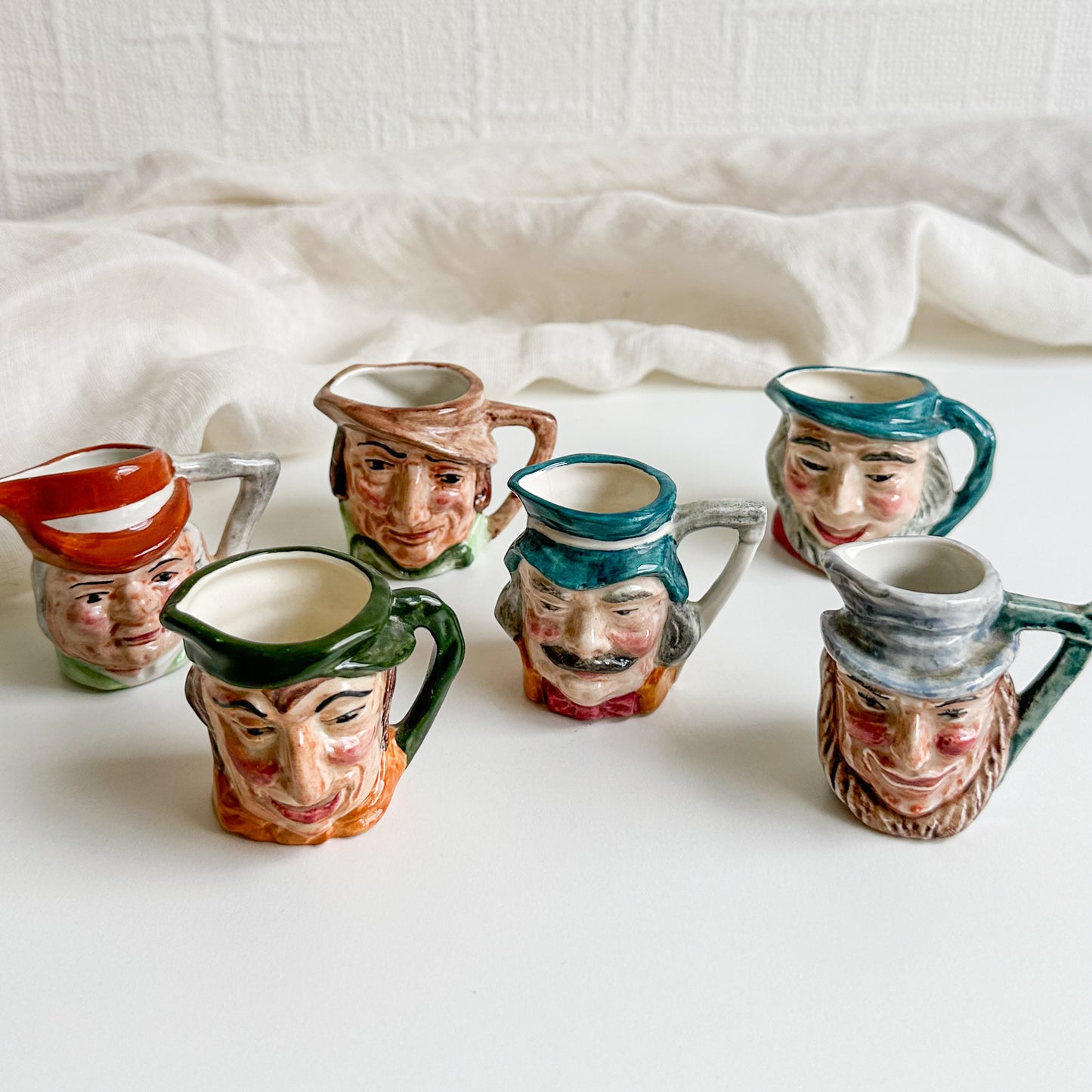 6 Miniature Toby Jugs