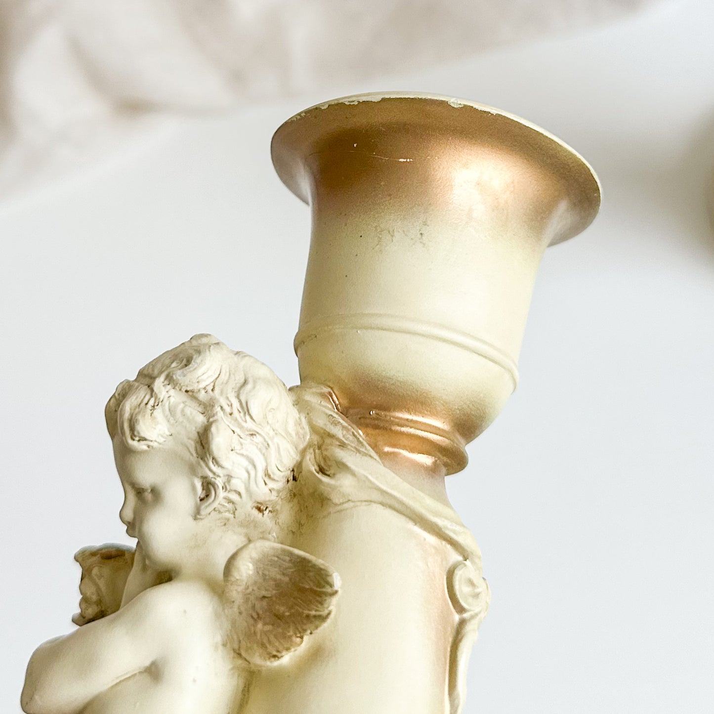 Pair of Cherub Candlesticks