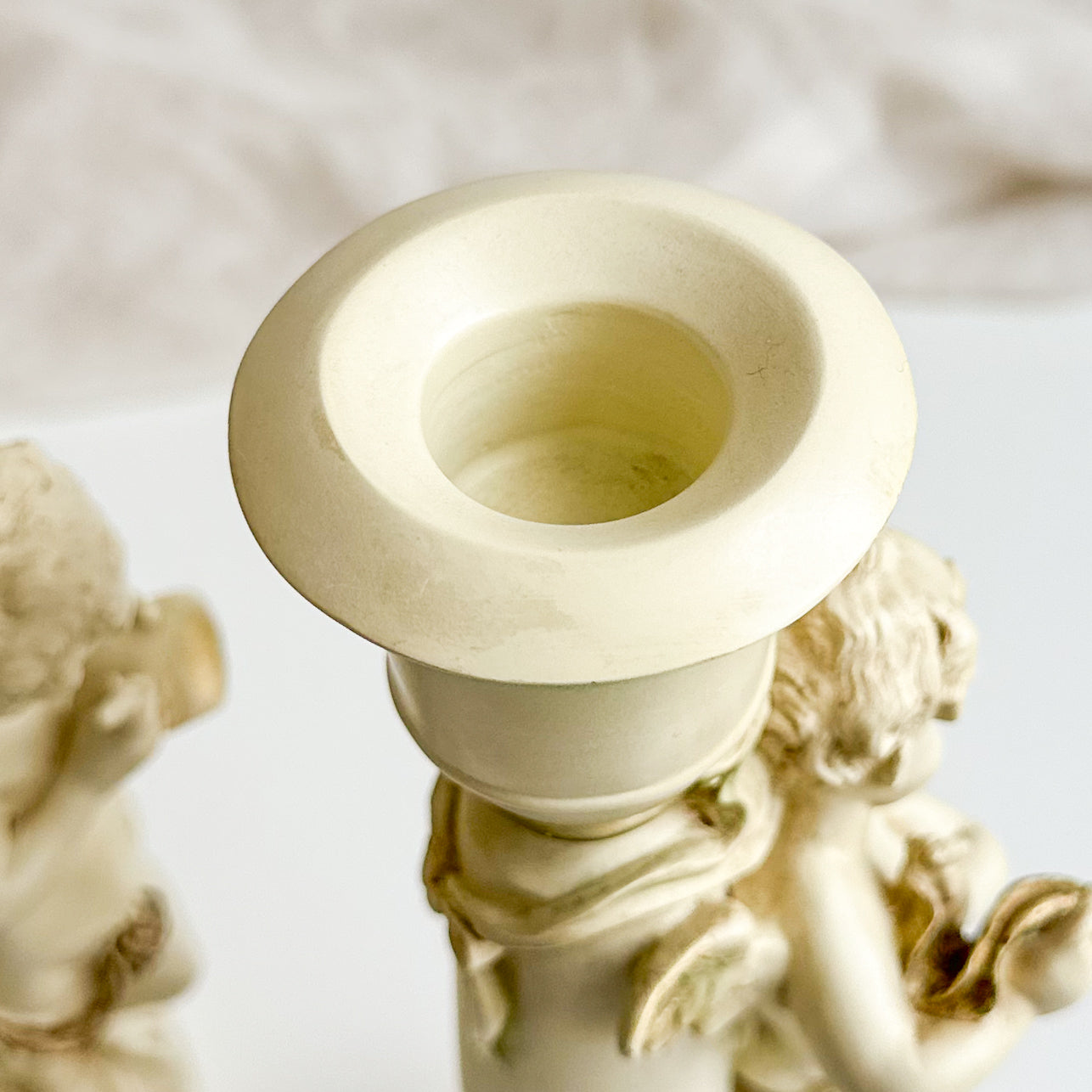 Pair of Cherub Candlesticks