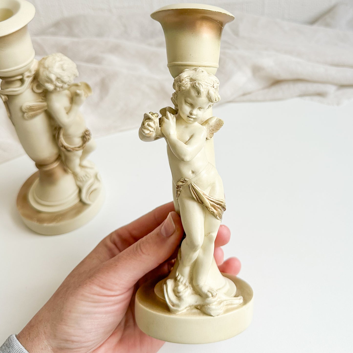 Pair of Cherub Candlesticks