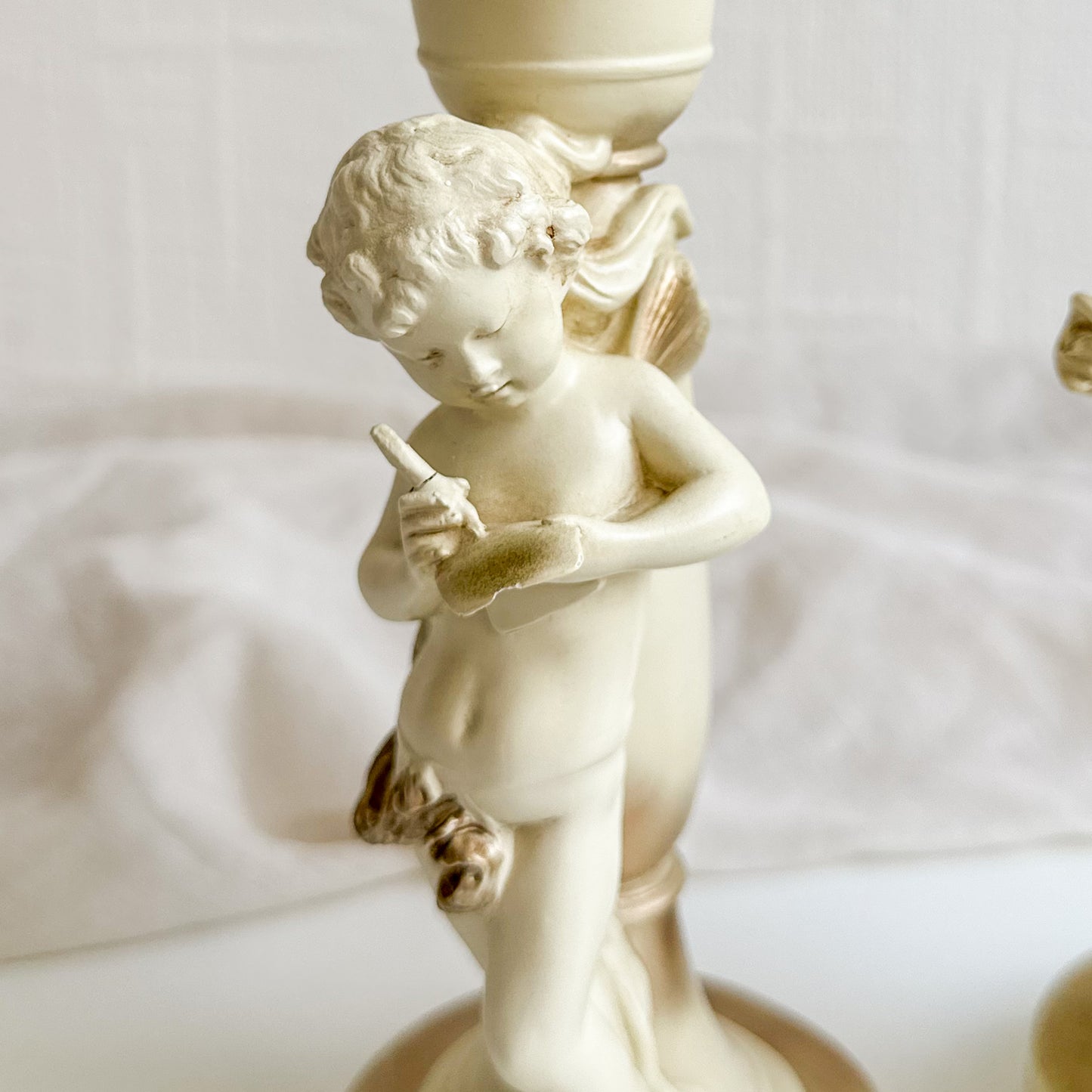 Pair of Cherub Candlesticks