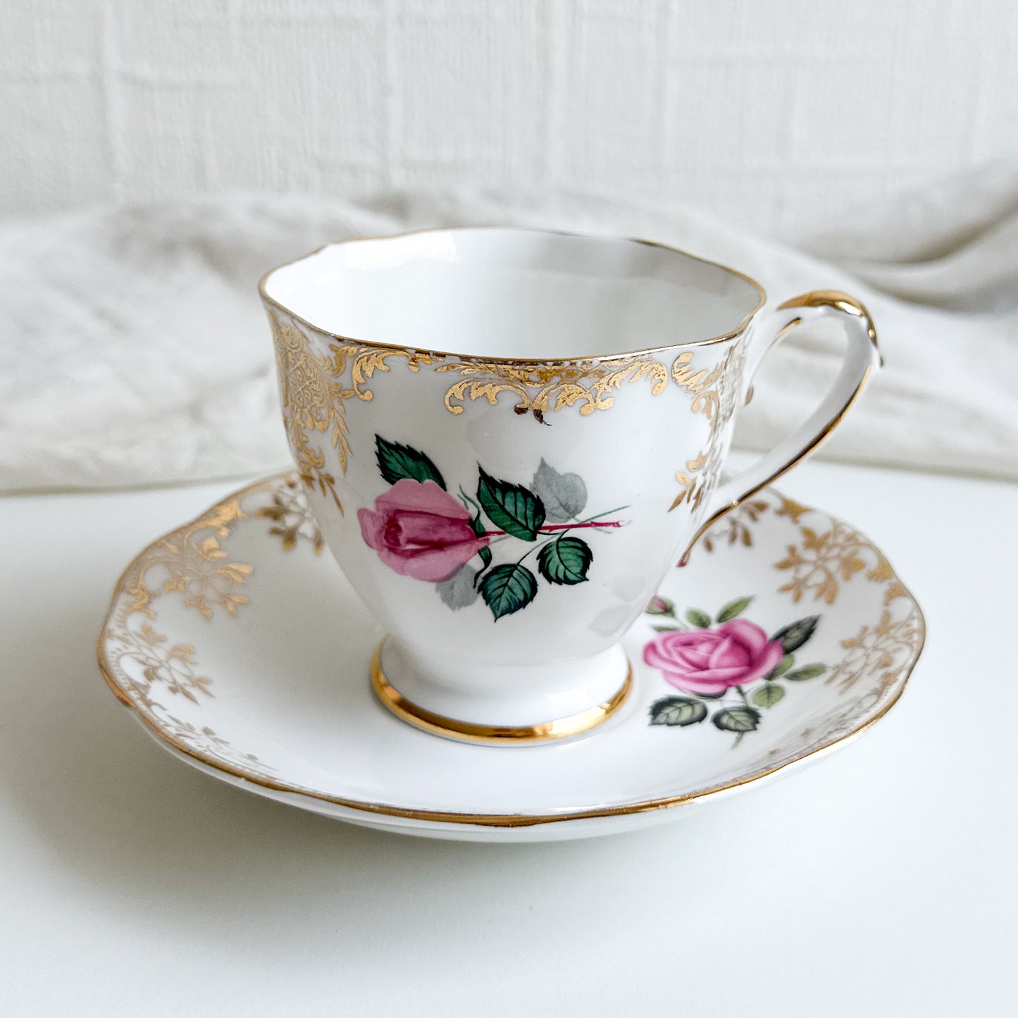 Mismatched Teacup and Saucer