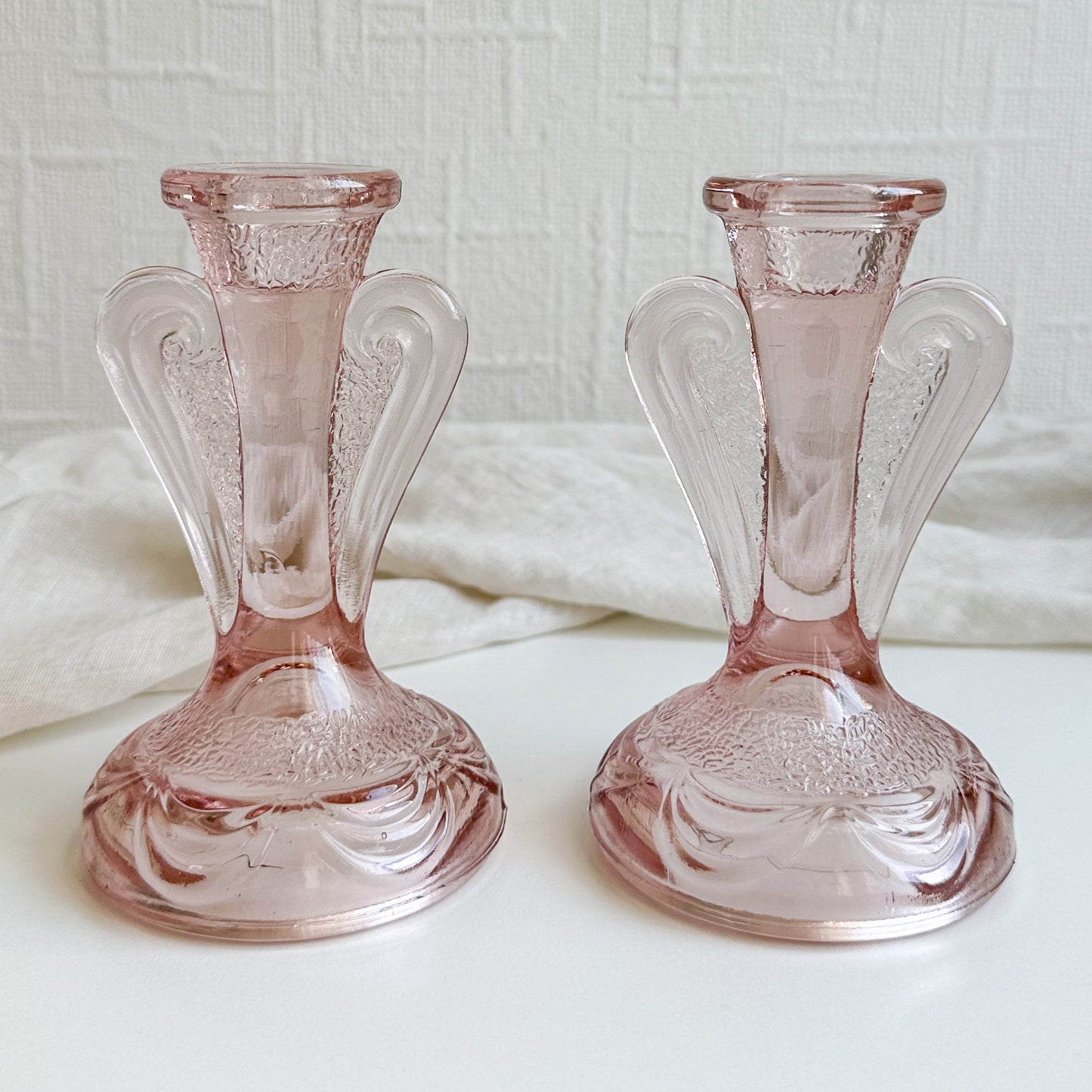 Pair of Pink Glass Candlesticks