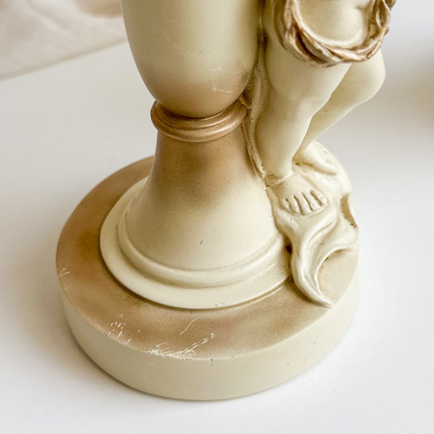 Pair of Cherub Candlesticks