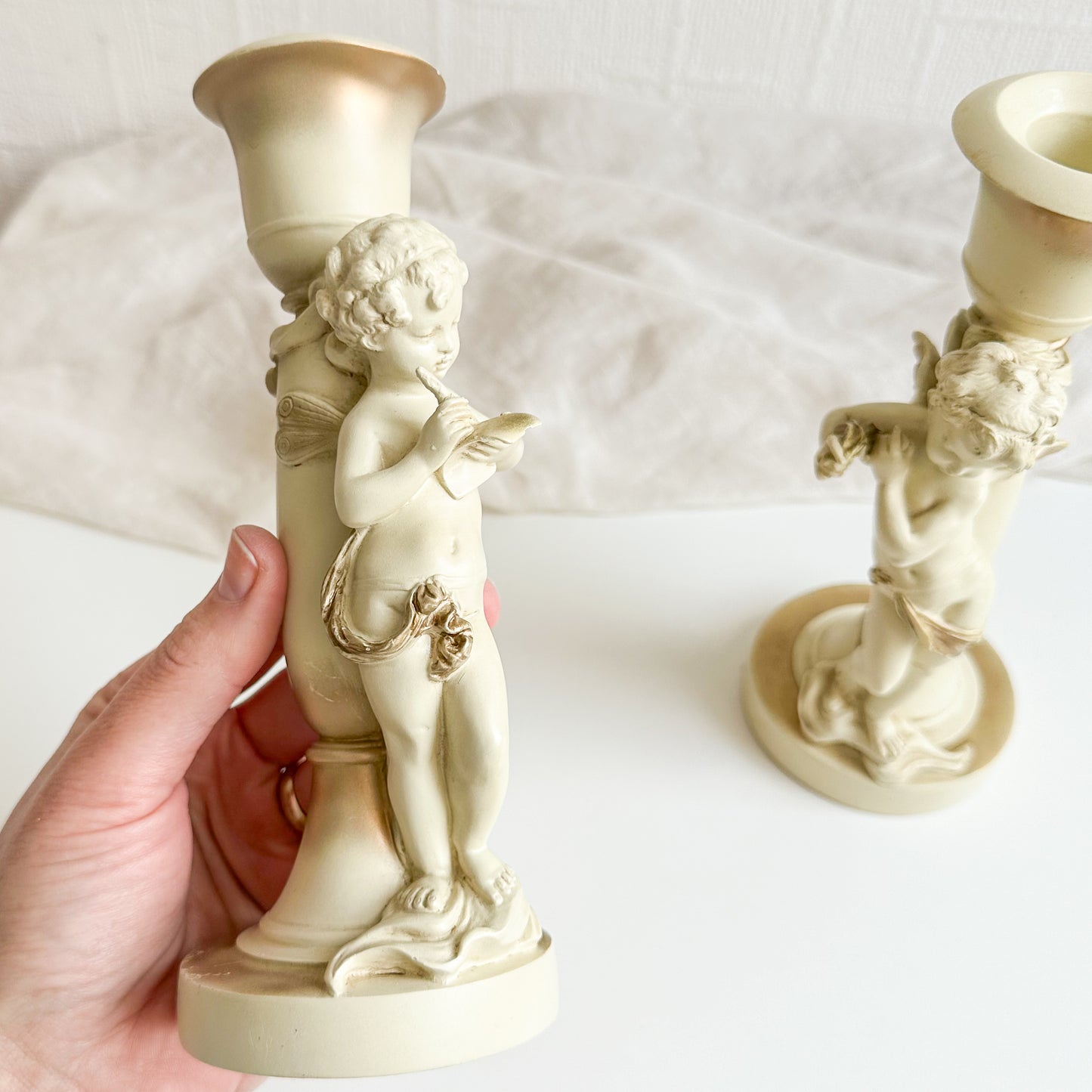 Pair of Cherub Candlesticks