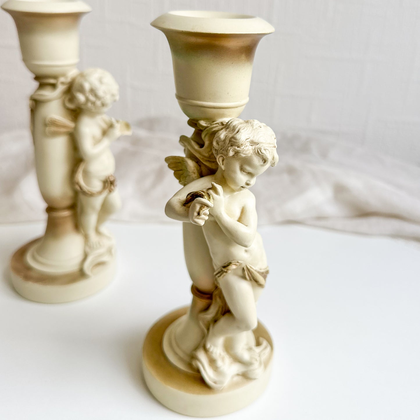 Pair of Cherub Candlesticks