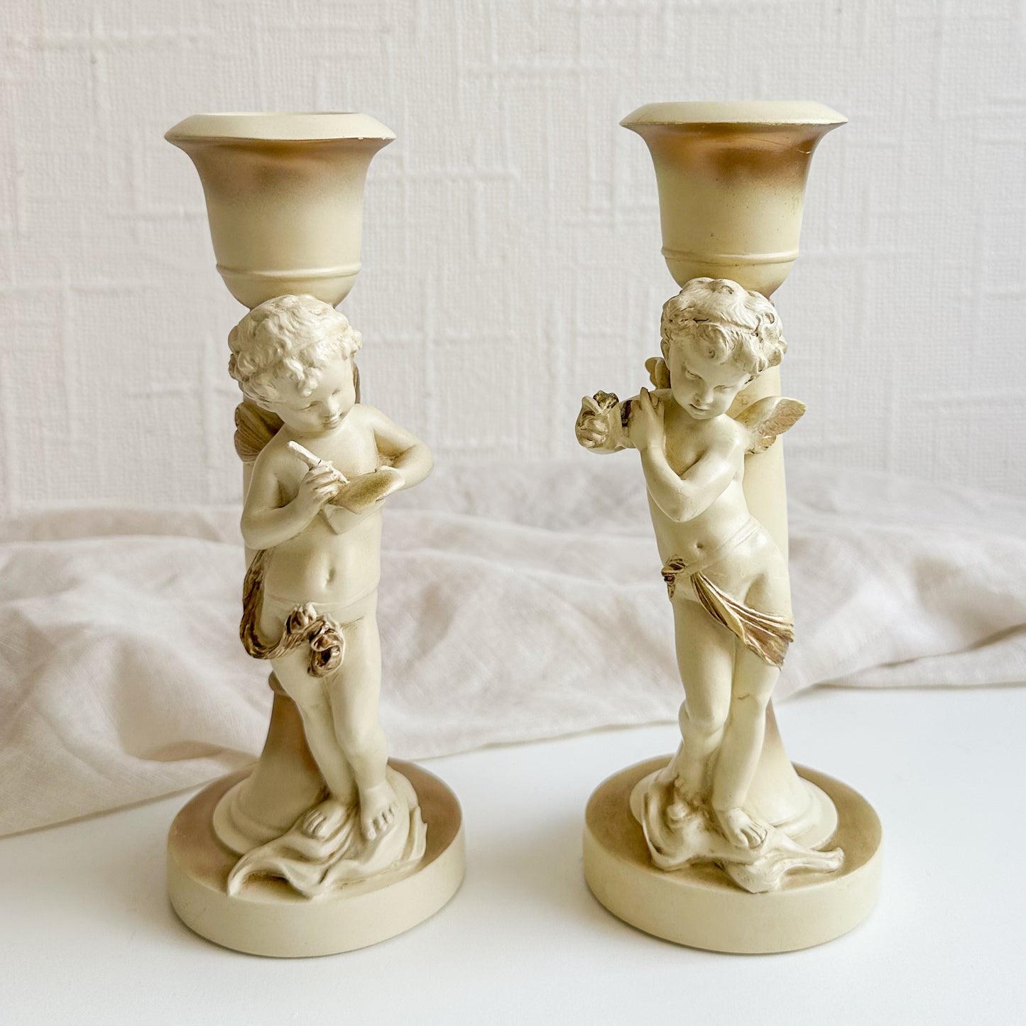 Pair of Cherub Candlesticks