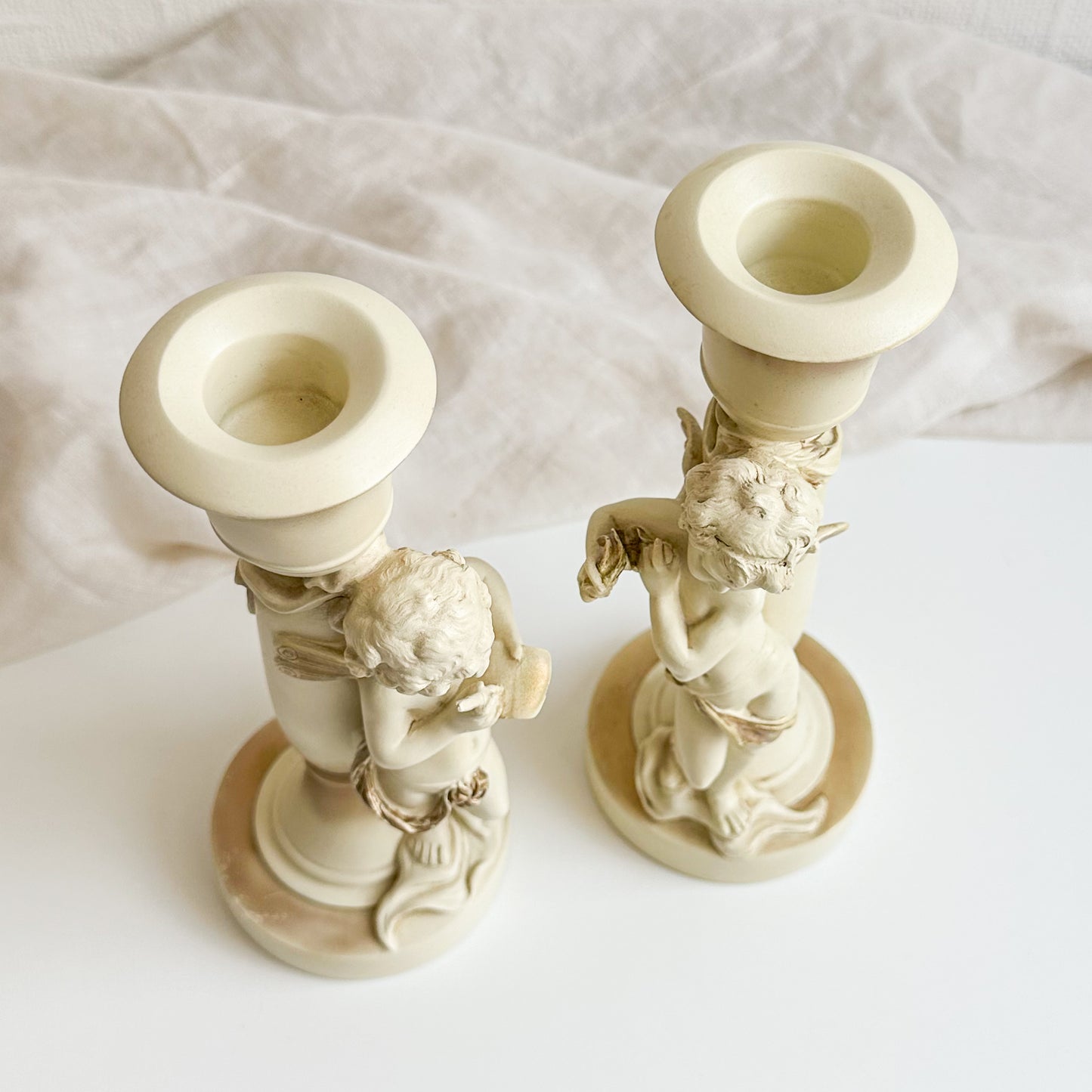 Pair of Cherub Candlesticks