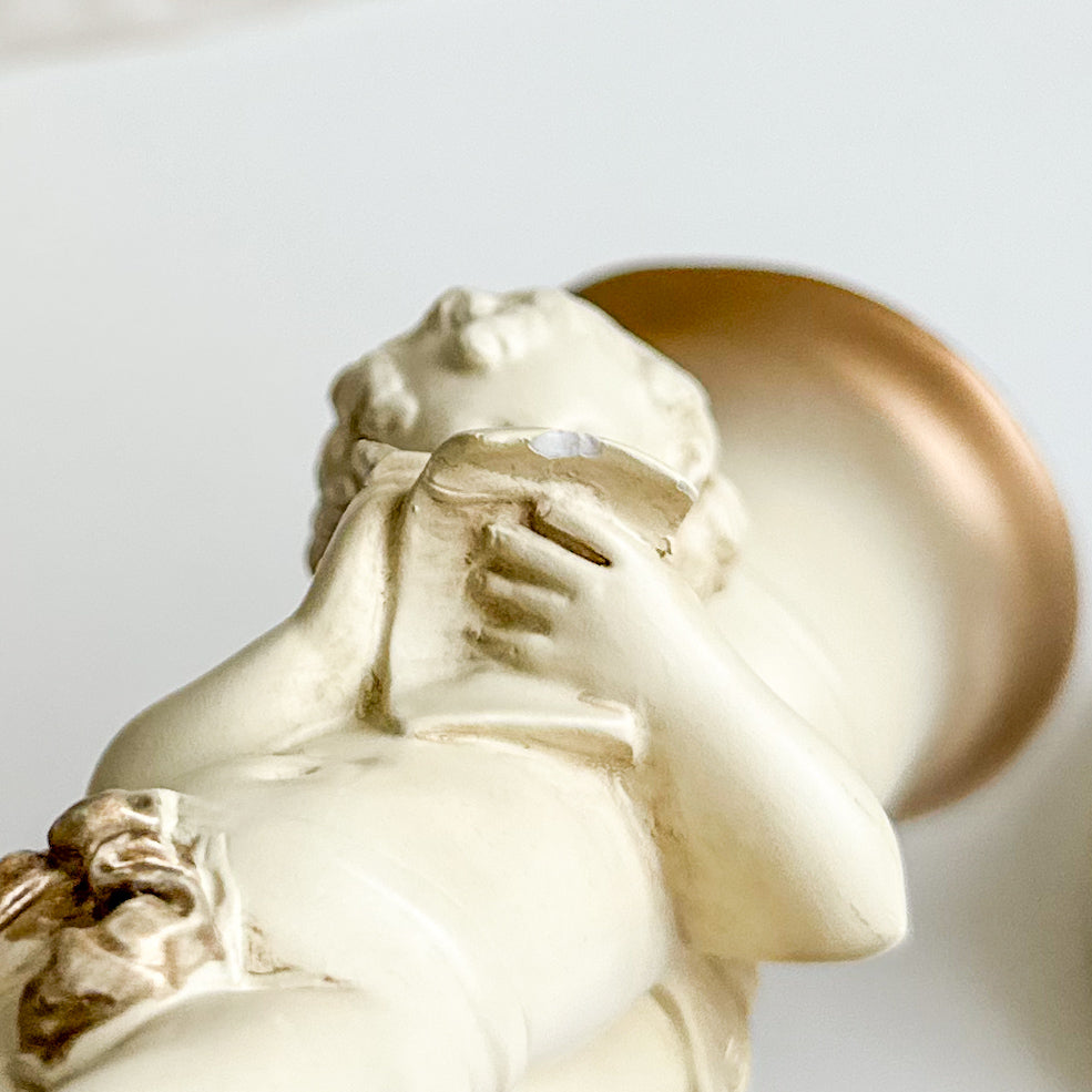 Pair of Cherub Candlesticks