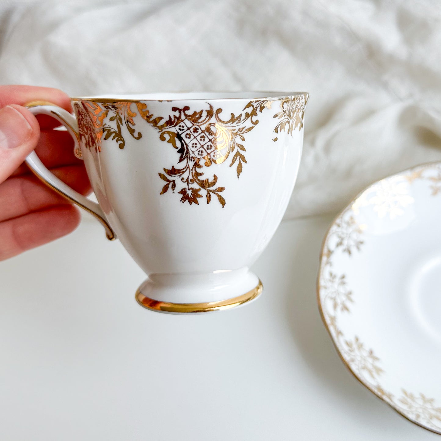 Mismatched Teacup and Saucer