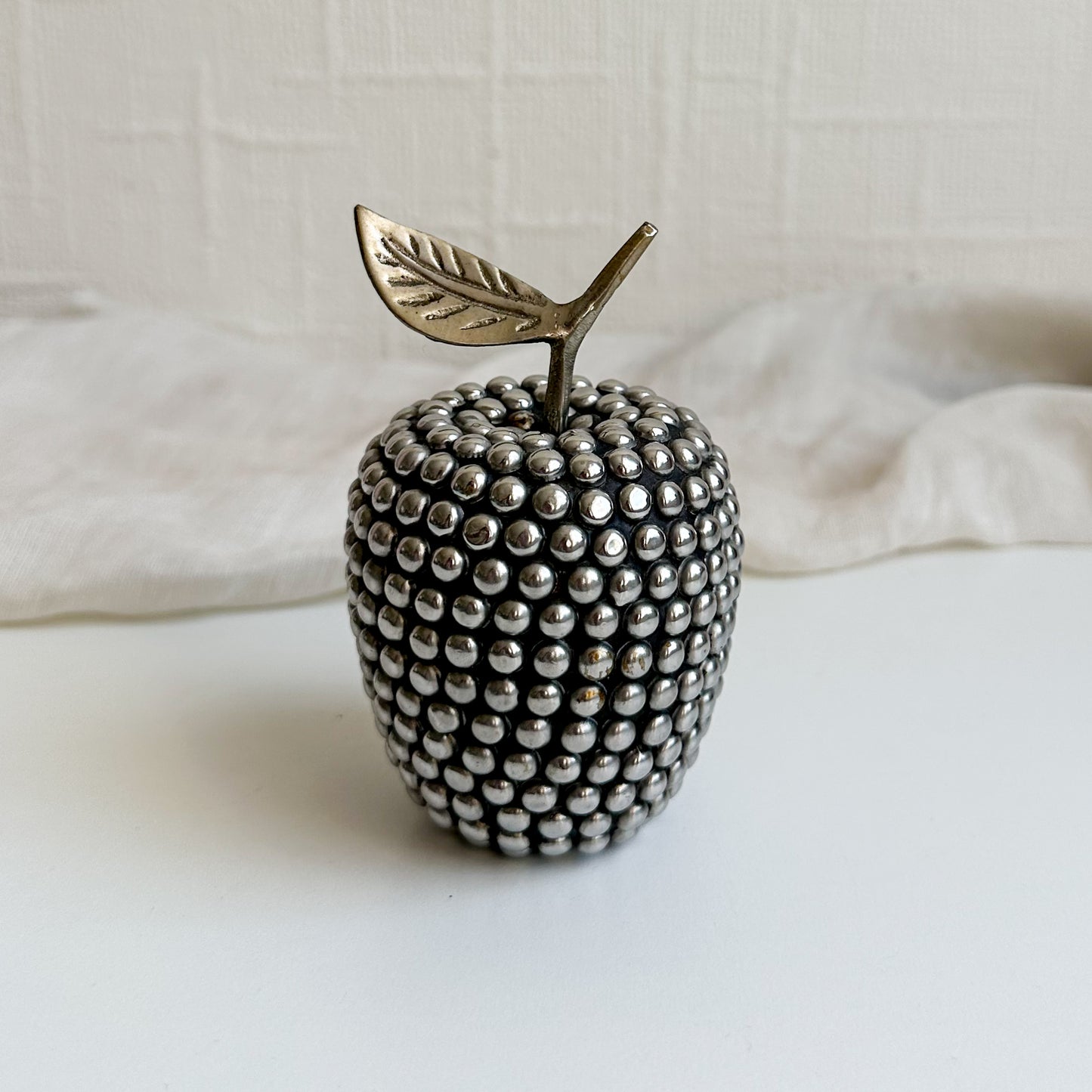 Studded Apple with Brass Leaf
