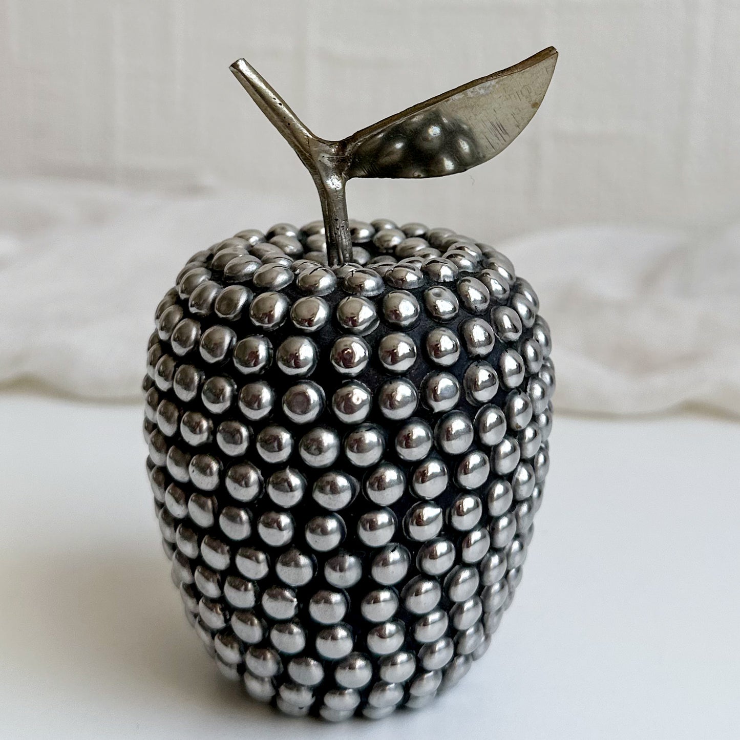 Studded Apple with Brass Leaf