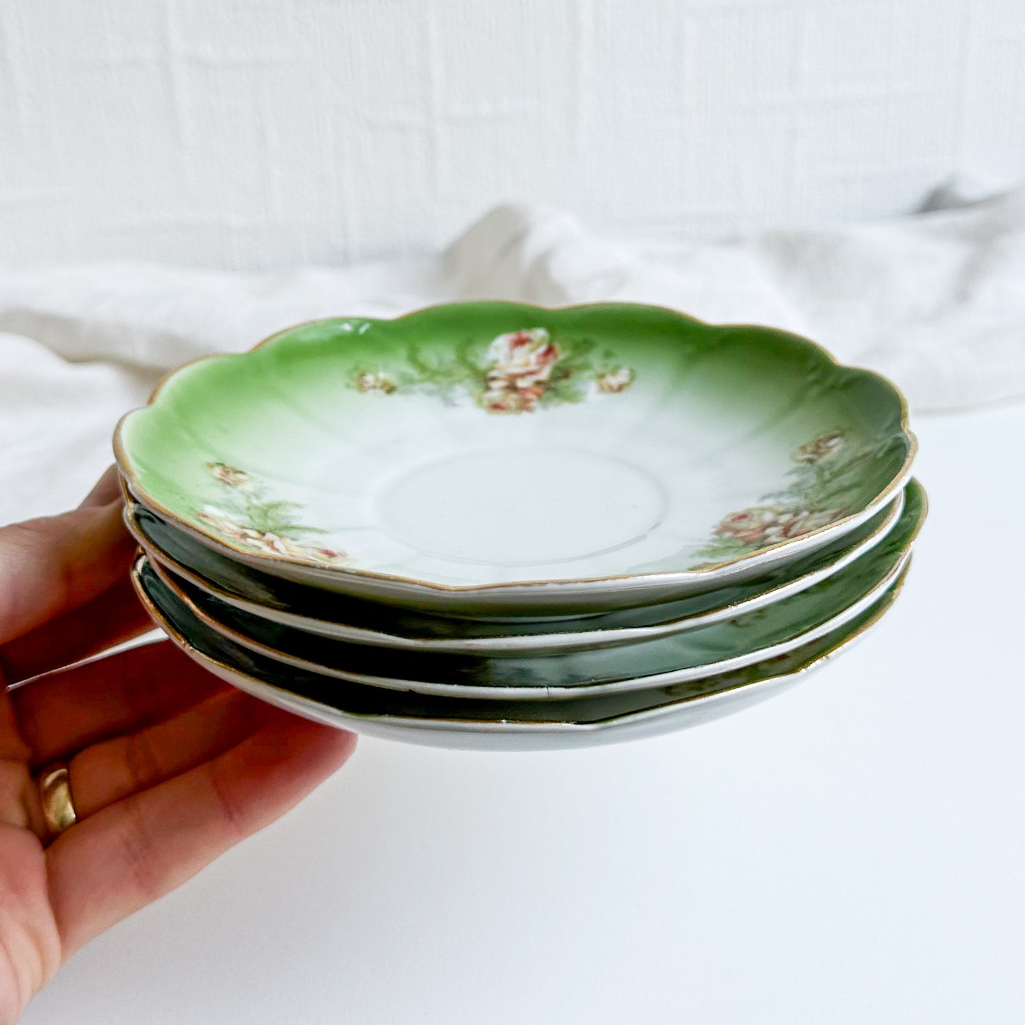Set of 4 Antique Saucers