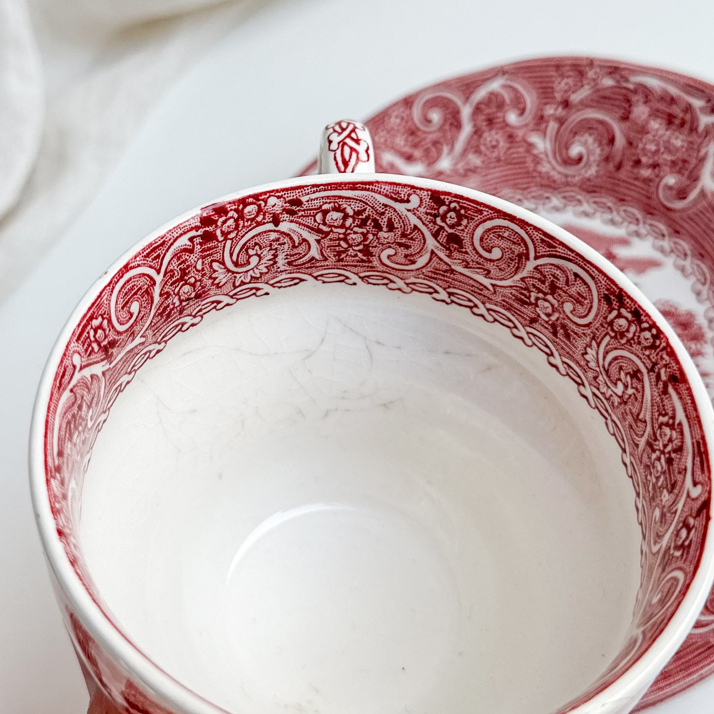 Pair of Red Transferware Tea Cups and Saucers