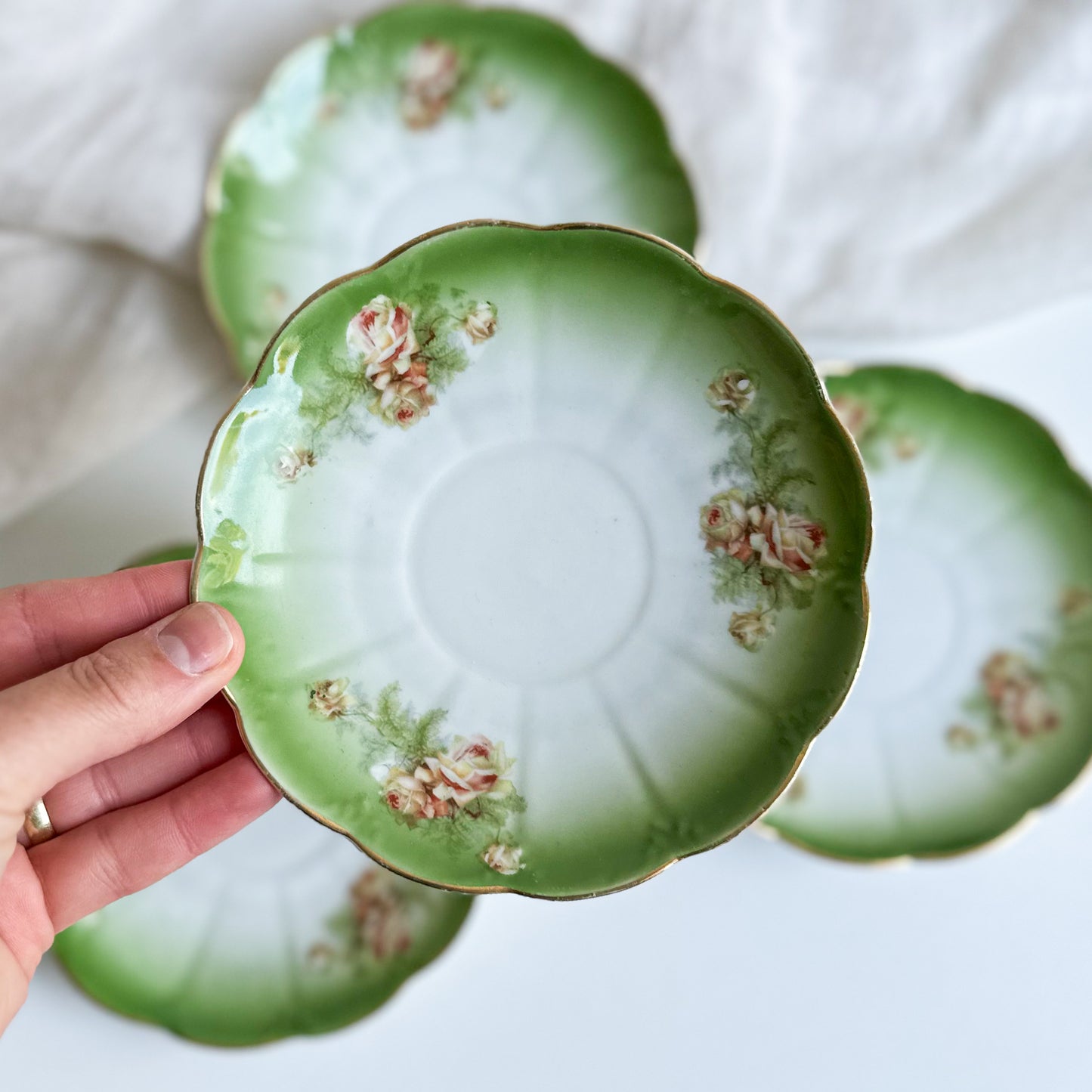 Set of 4 Antique Saucers