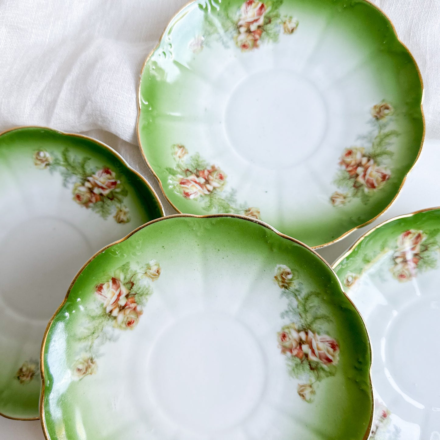 Set of 4 Antique Saucers