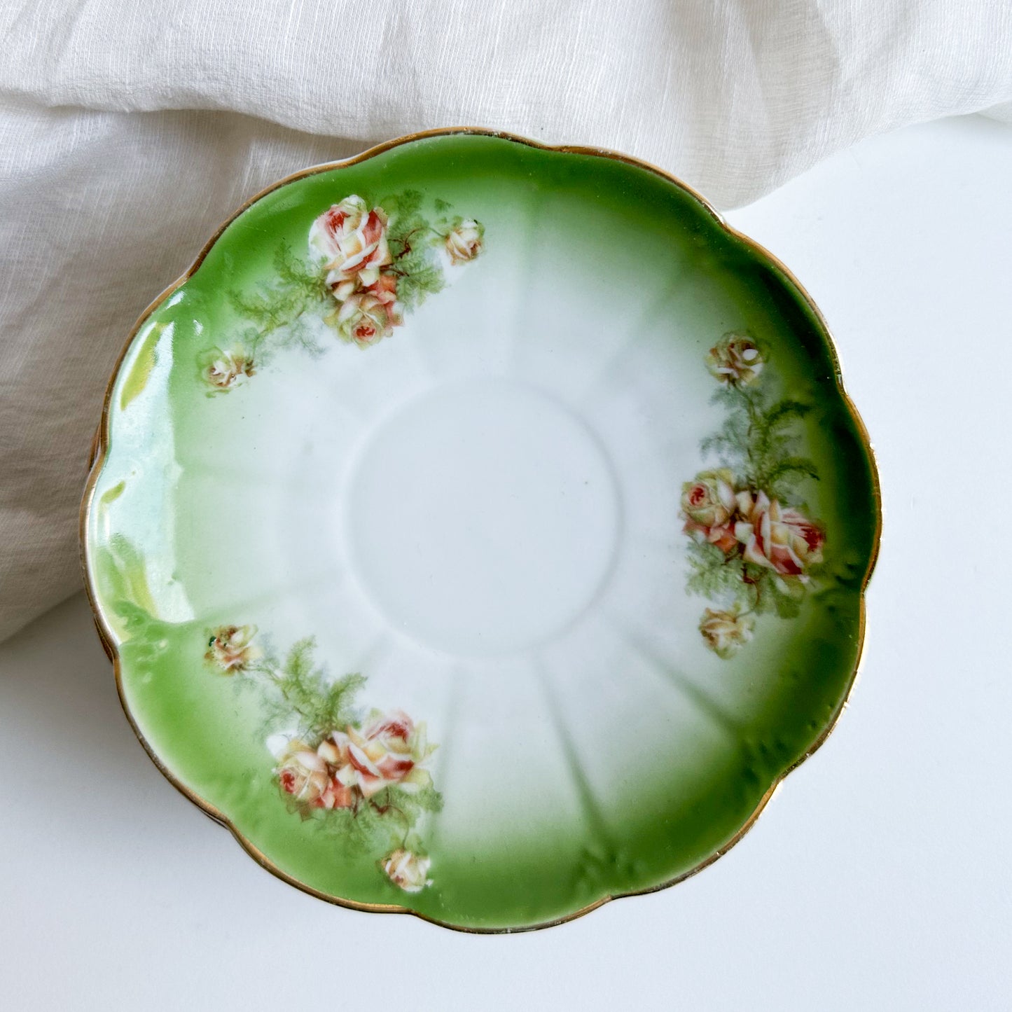 Set of 4 Antique Saucers