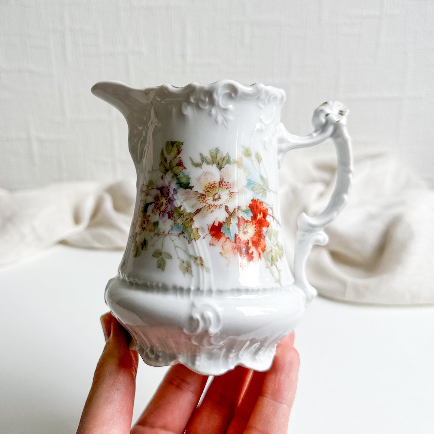 Antique Floral Jug with Raised Details