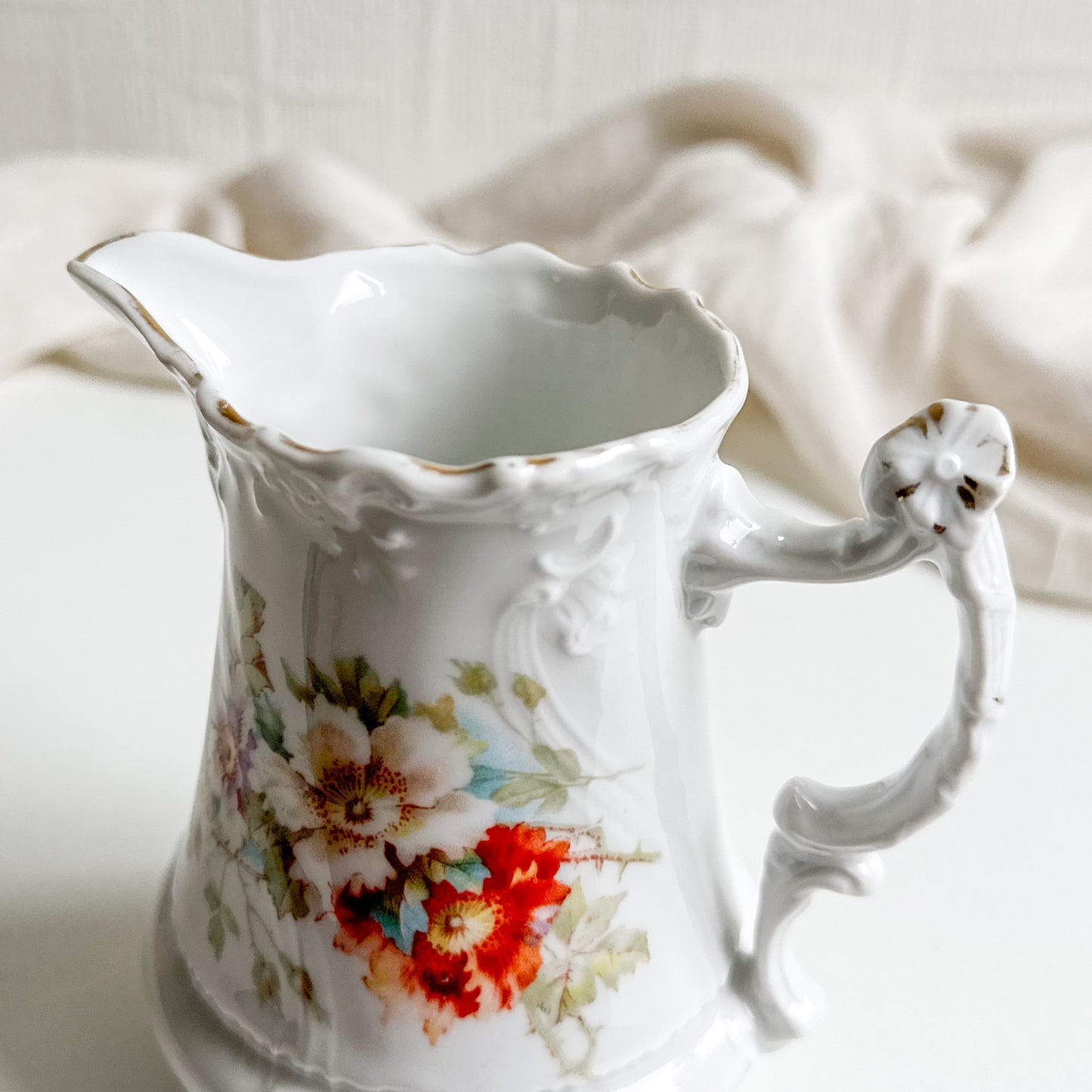 Antique Floral Jug with Raised Details