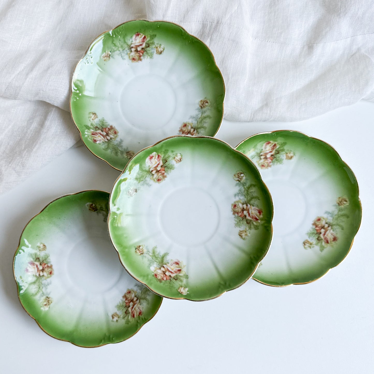 Set of 4 Antique Saucers