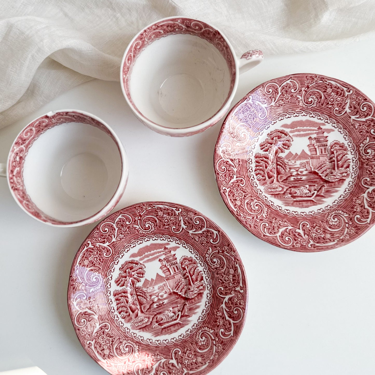 Pair of Red Transferware Tea Cups and Saucers