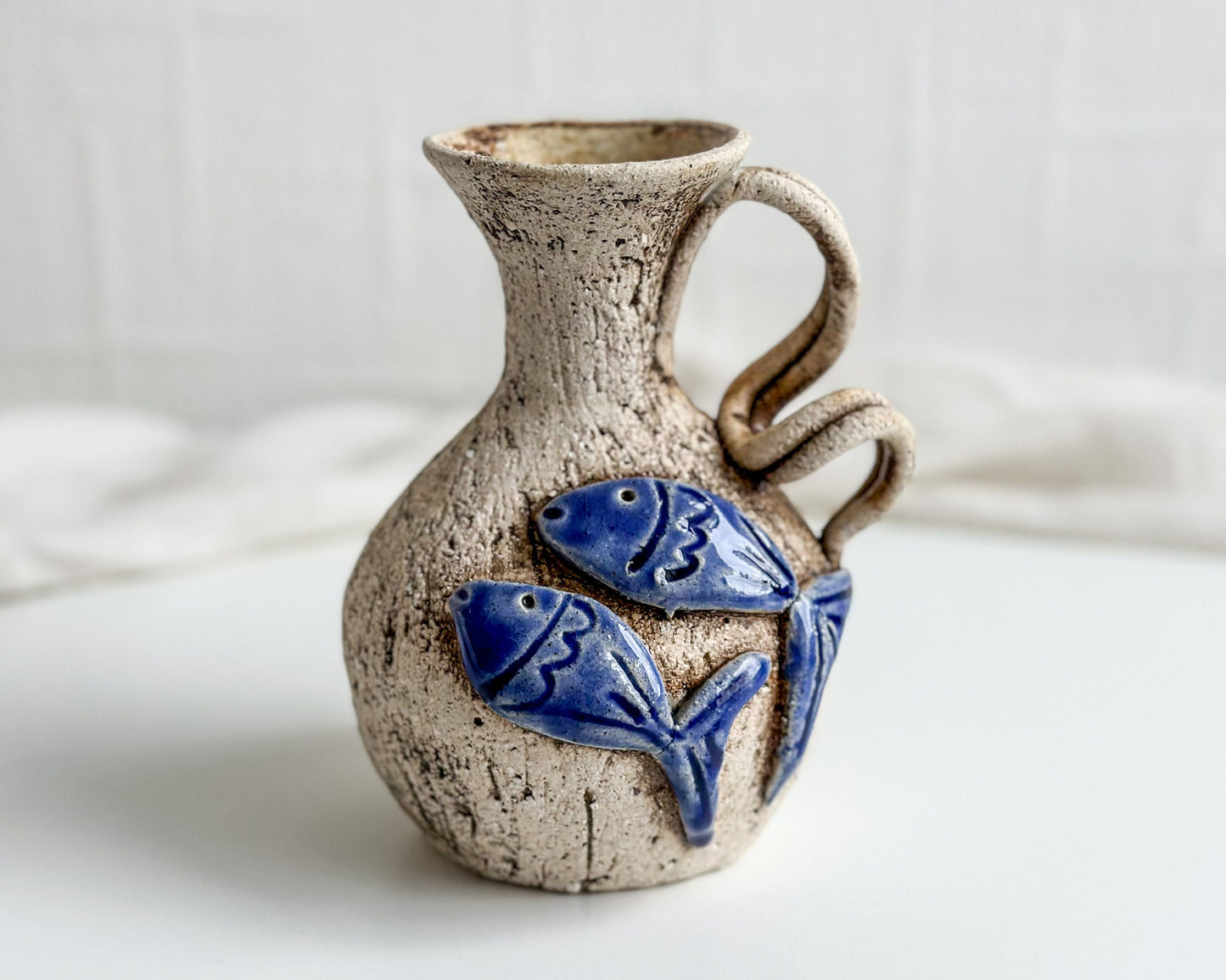 Small Jug with Fish Design